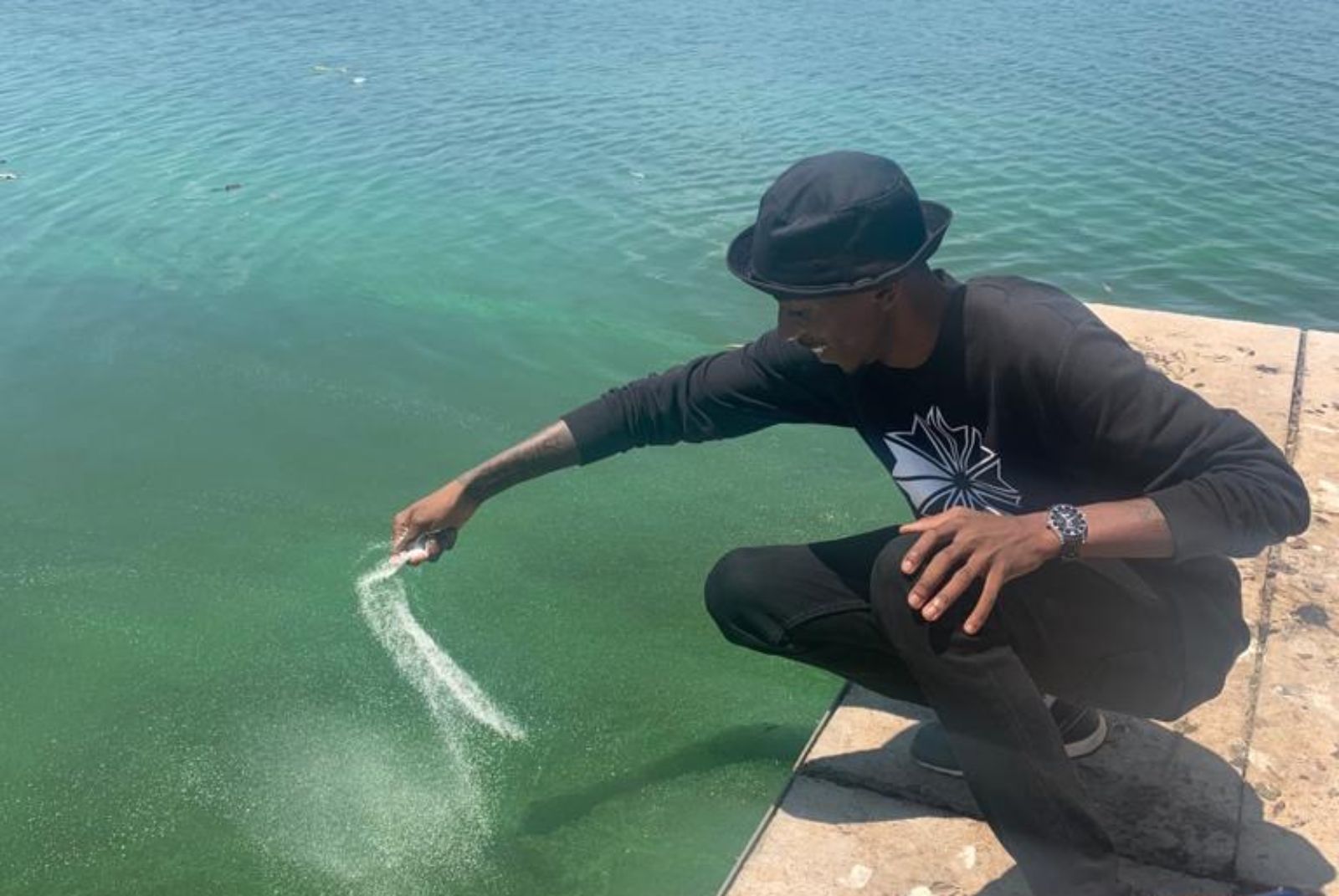 Lake Guard pellets are thrown into the Roodeplaat Dam Reservoir to treat toxic algal blooms. Photo: courtesy