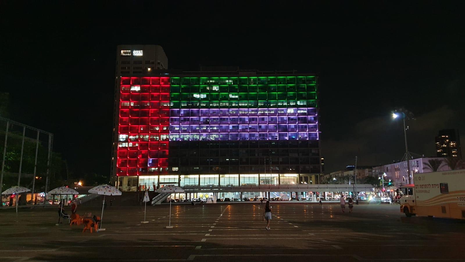 Tel Aviv’s municipal building lit up in the design of the UAE flag, August 13, 2020. Photo courtesy of Tel Aviv-Yafo Municipality