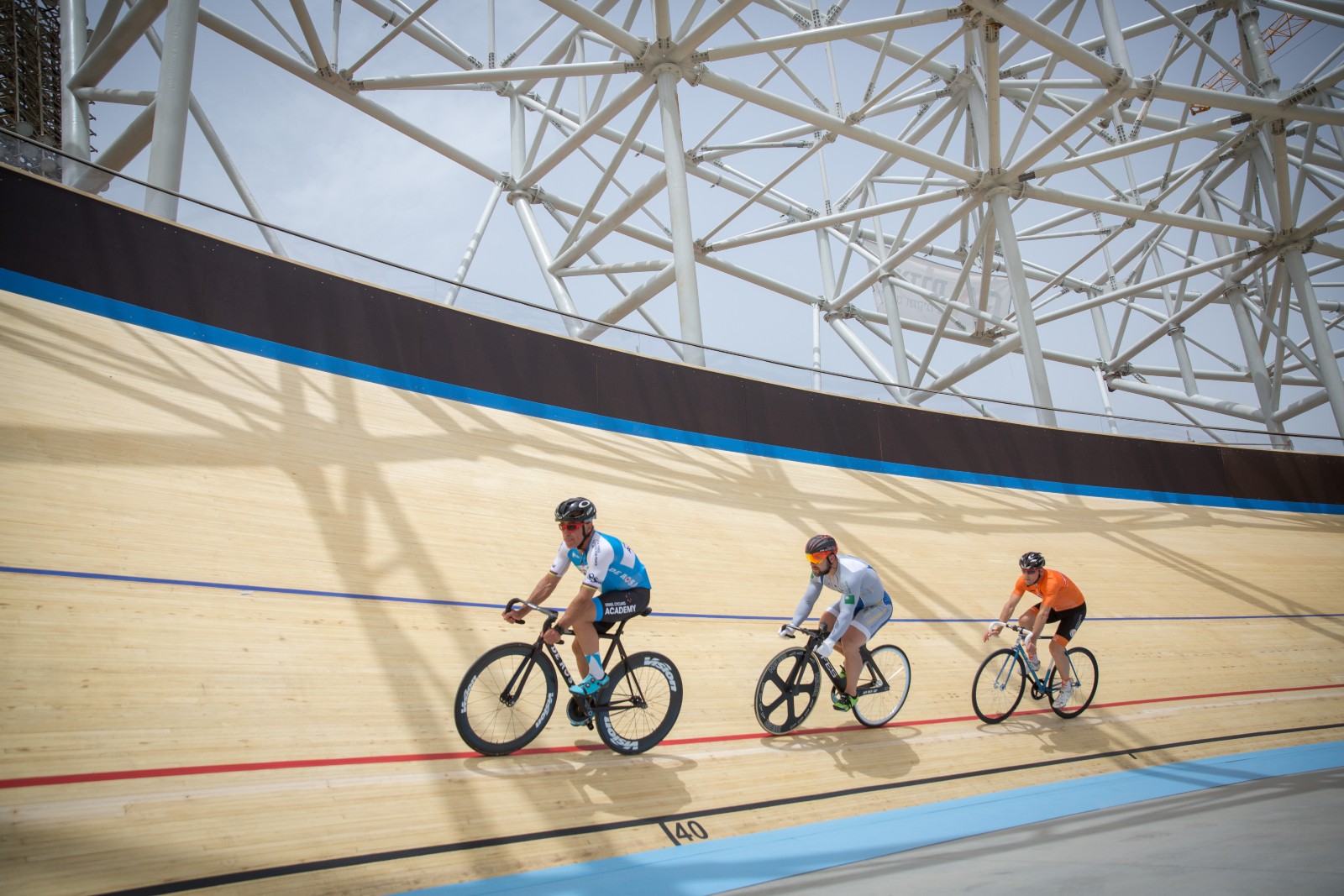Sylvan Adams leads cyclists inaugurating the Olympic-sized velodrome he built in Tel Aviv in 2018. Photo by Miriam Alster/FLASH90