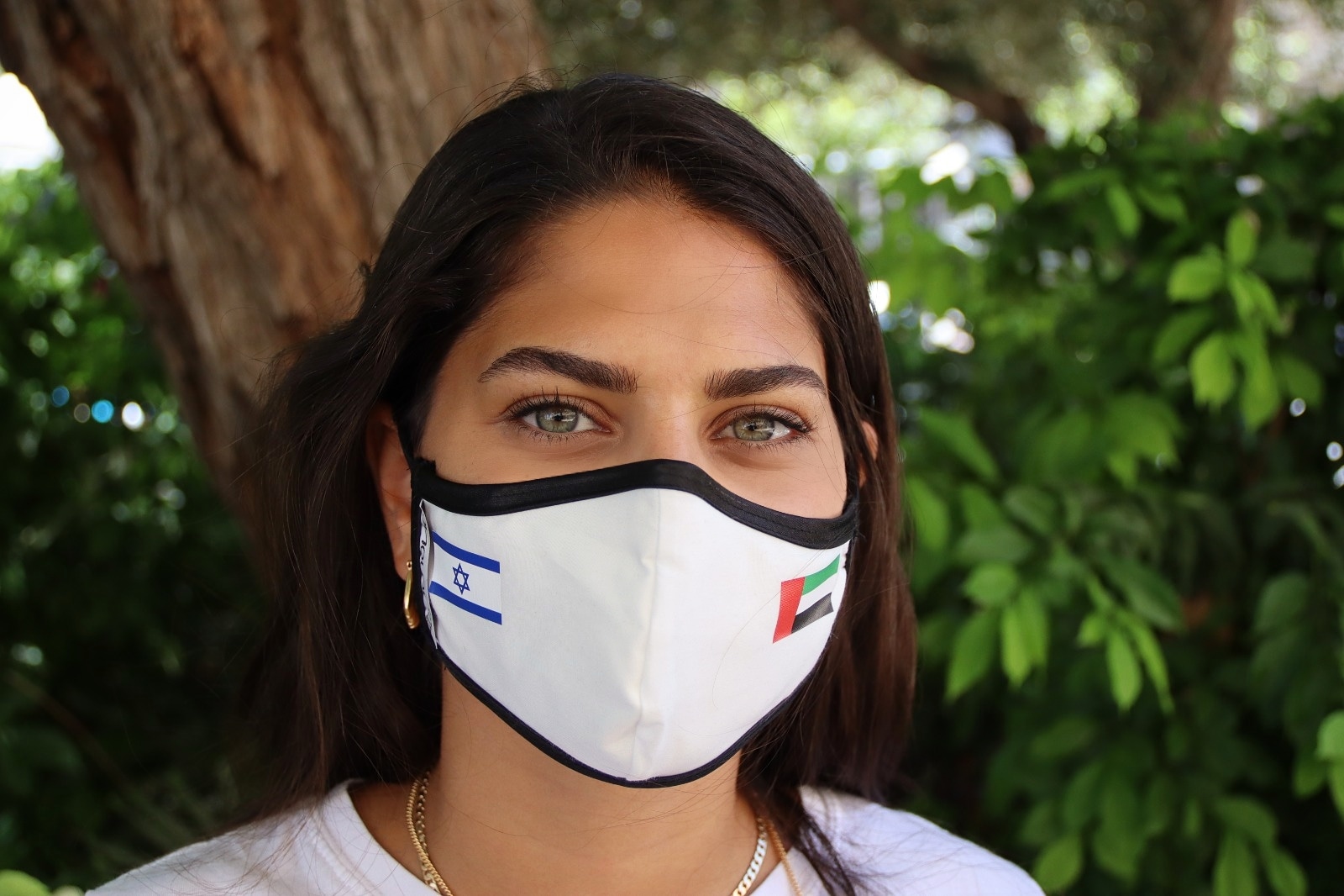 Sonovia employee Vidhura Malkowsky modeling the “SalaMask” limited-edition SonoMask featuring the UAE and Israeli flags. Photo: courtesy