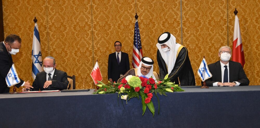 Israeli National Security Council Director Meir Ben-Shabbat, left, participated in signing ceremonies in Bahrain on October 18, 2020. Photo by Haim Zach/GPO