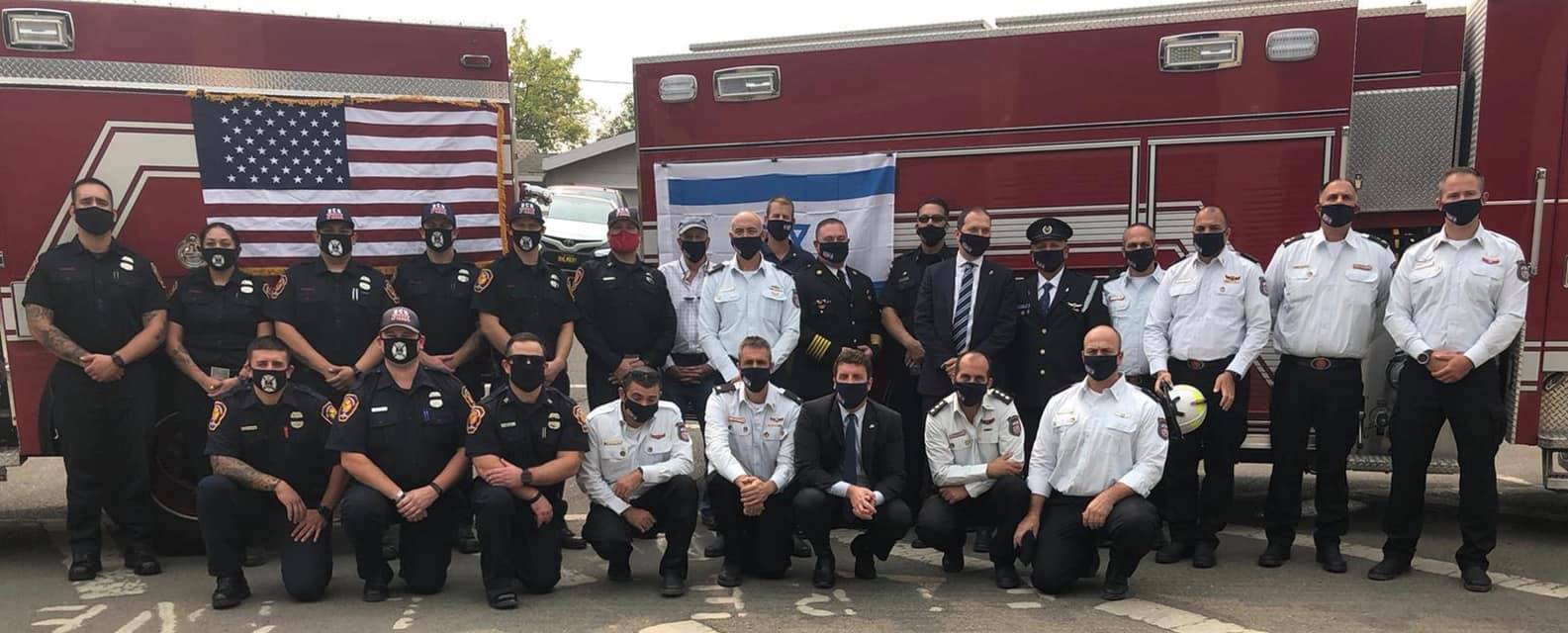10 Israeli firefighters (in white) with colleagues from CalFire, September 2020. Photo courtesy of Israeli Consulate in San Francisco