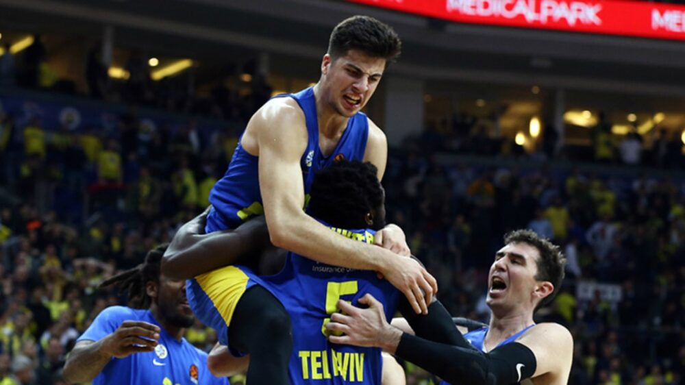 being hoisted by teammates. Photo courtesy of Maccabi Playtika Tel Aviv