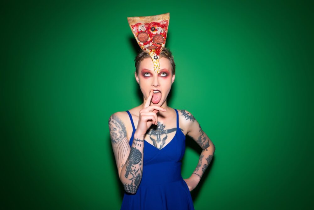 No, that’s not a real slice. It’s a pizza hat by Maor Zabar. Photo by Jude Moskovich
