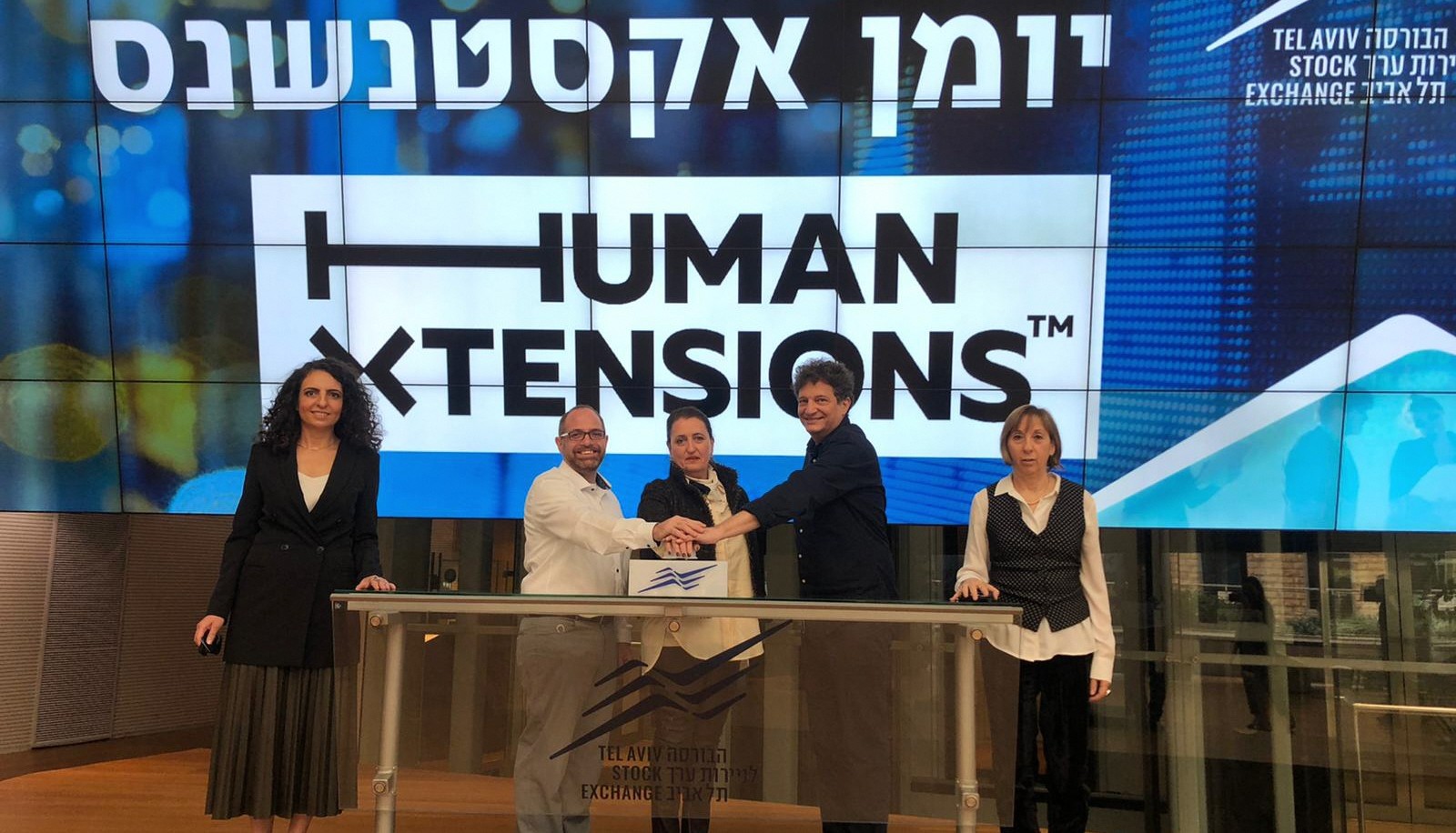 From left, Yana Chernyak, economist at TASE's Listings Unit; Asaf Stolovy, CFO of Human Xtensions; Dr. Tami Frenkel, CEO of Human Xtensions; Alon Shlank, chairman of the board; and Hani Shitrit Bach, EVP and head of listings at TASE. Photo courtesy of TASE