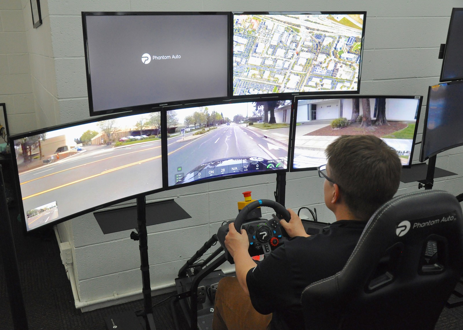Phantom Auto remote operators can monitor up to five monitors at once. Photo courtesy of Phantom Auto