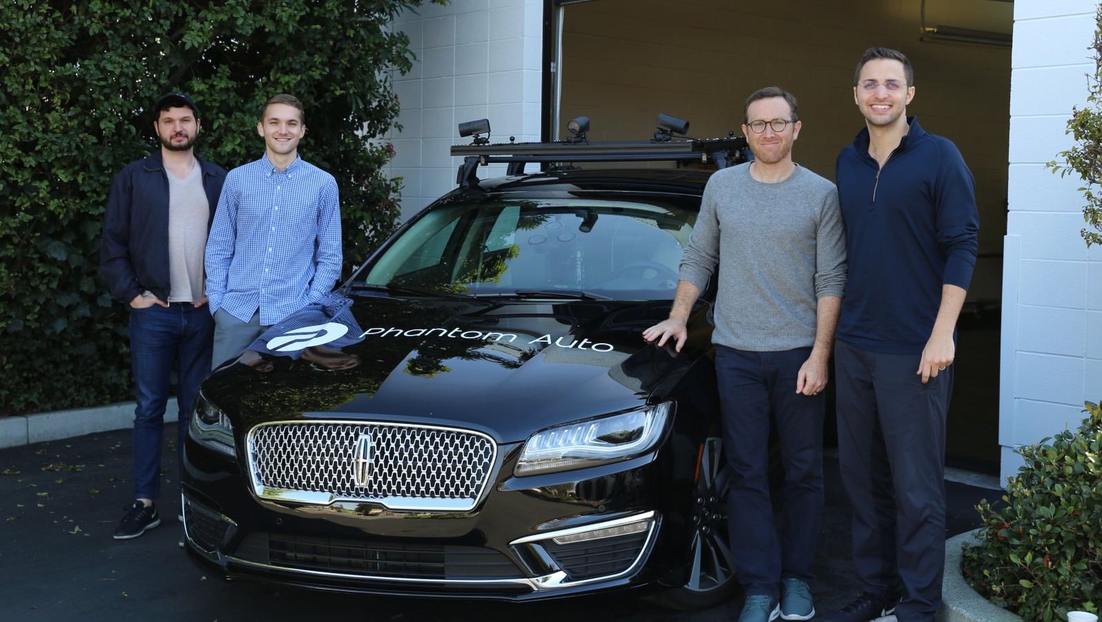 Phantom Auto team members including cofounders Shai Magzimof and Elliot Katz, right. Photo courtesy of Phantom Auto