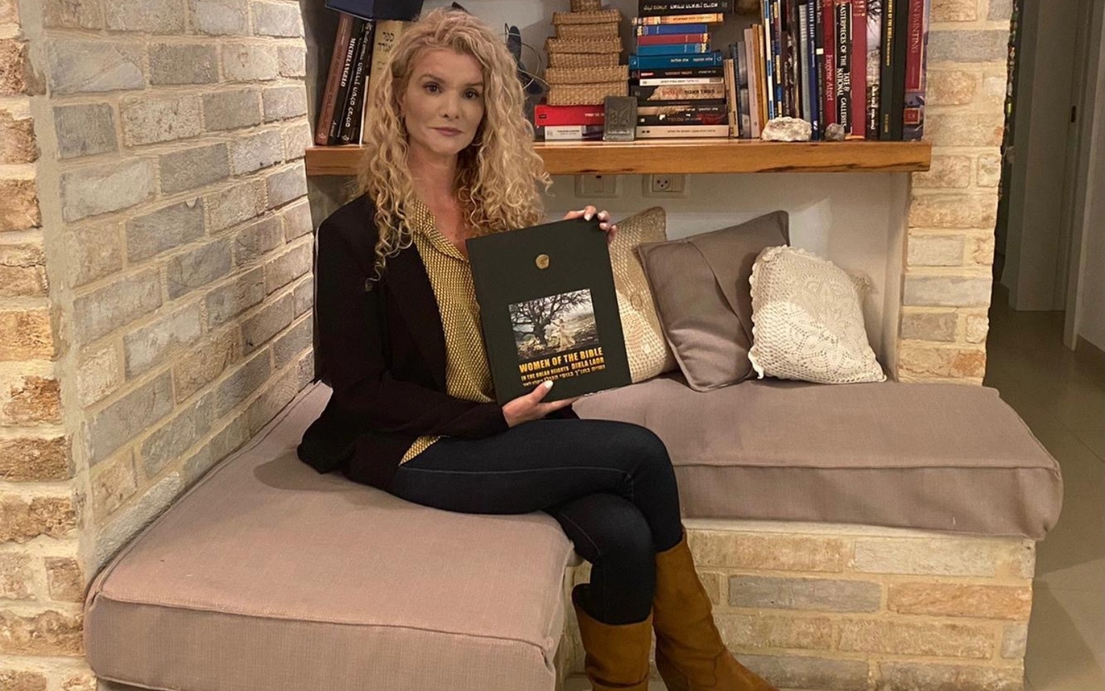 Dikla Laor with her book, “Women of the Bible in the Golan Heights.” Photo courtesy of Dikla Laor
