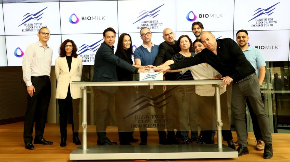 From left, TASE CEO Ittai Ben Zeev and Listing Companies Compliance Unit Manager Anat Geron with BioMilk’s cofounders and executive team at the company’s IPO, April 2021. Photo by Sivan Farag
