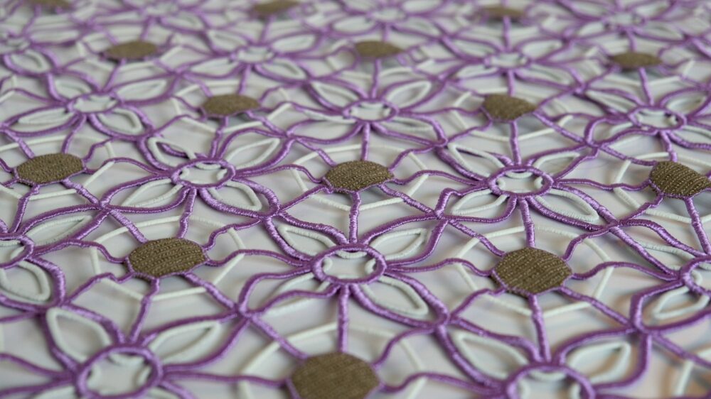 A flower-patterned textile with an internal system of electronics. Photo by Ganit Goldstein