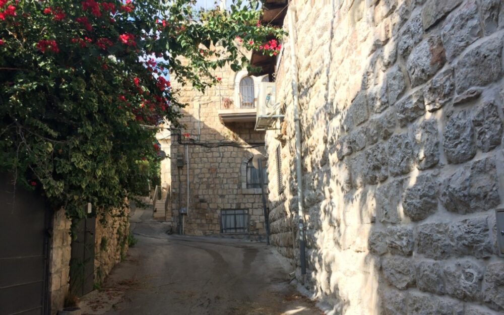 One of the many colorful and quaint streets of Ein Kerem. Photo by Arnold Slyper