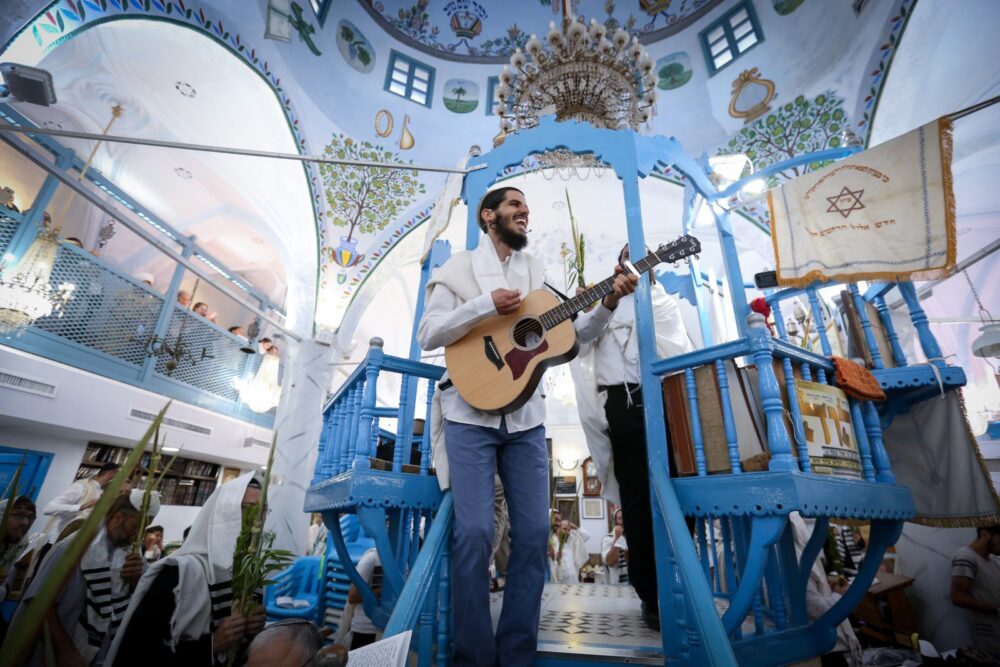 A Sukkot prayer service at the Abuhav synagogue in Tzfat, September 2018. Photo by David Cohen/Flash90