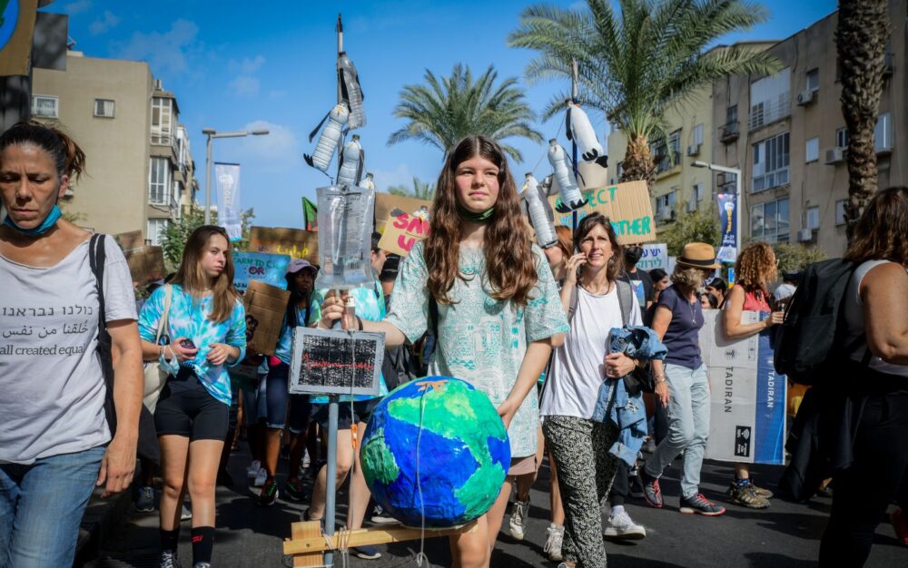 People can be encouraged to act in small, personal ways to help mitigate anxiety. Photo by Avshalom Sassoni/Flash90