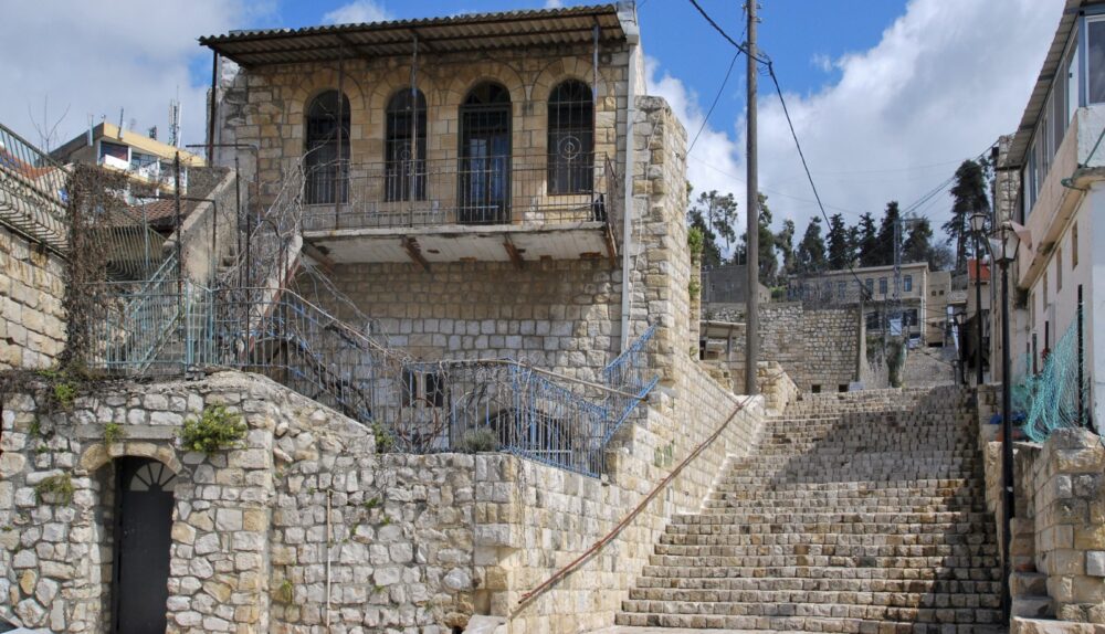 Steep staircases are a hallmark of hilly Tzfat (Safed). Photo by Sasha Taran via Shutterstock.com