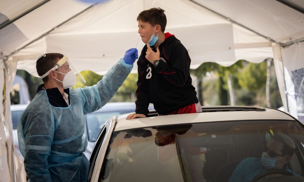 Magen David worker take a Covid-19 rapid antigen test at a Magen David Adom drive through complex in Jerusalem, January 10, 2022. Photo by Yonatan Sindel/Flash90