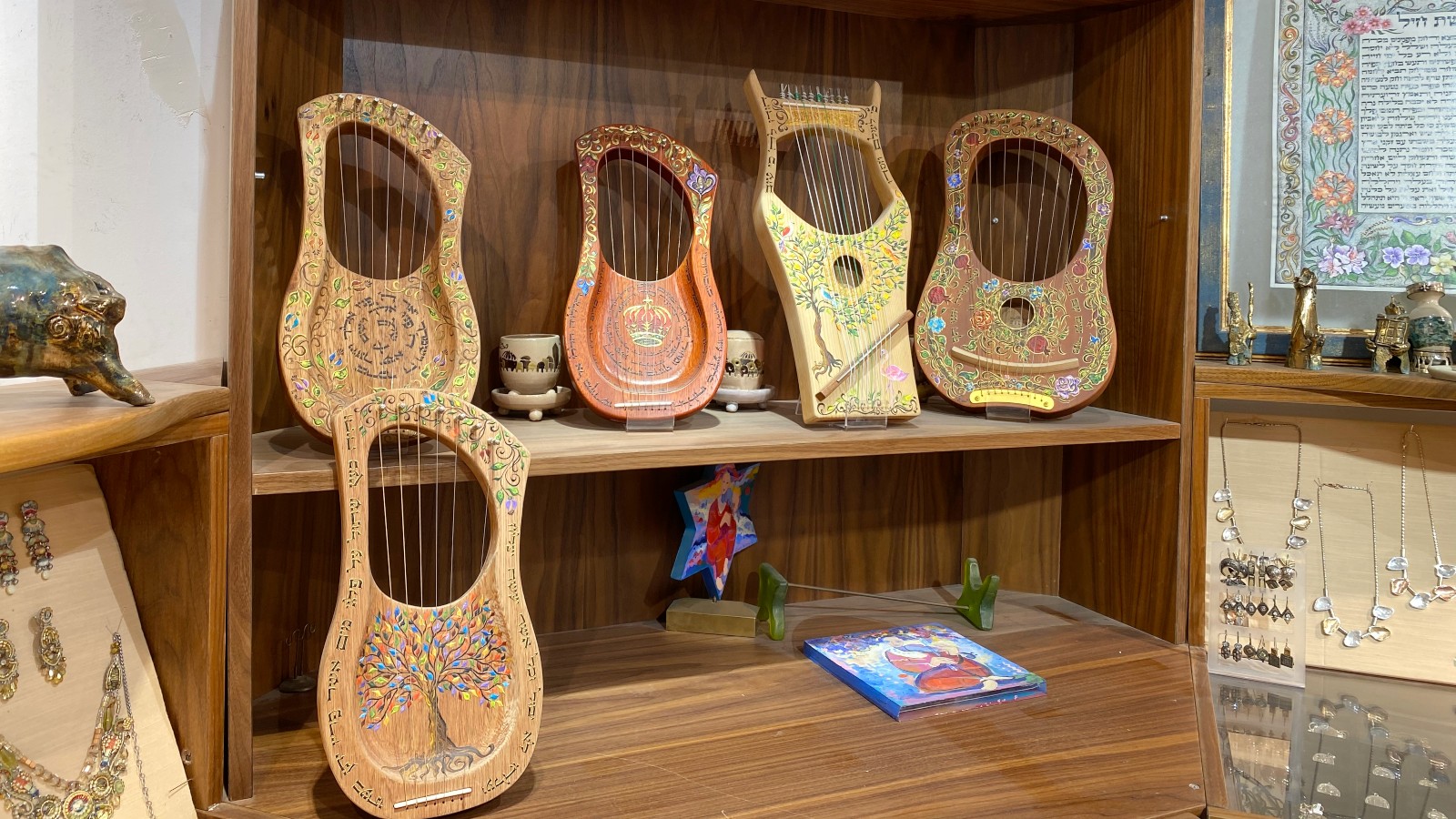 Hand-painted wooden harps at Rina in the Old City’s Cardo. Photo by Abigail Klein Leichman
