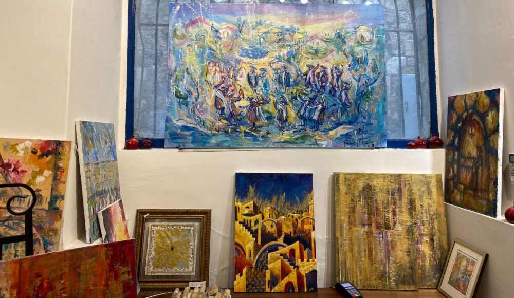 Paintings in the Western Wall Gallery in the Cardo. Photo by Abigail Klein Leichman