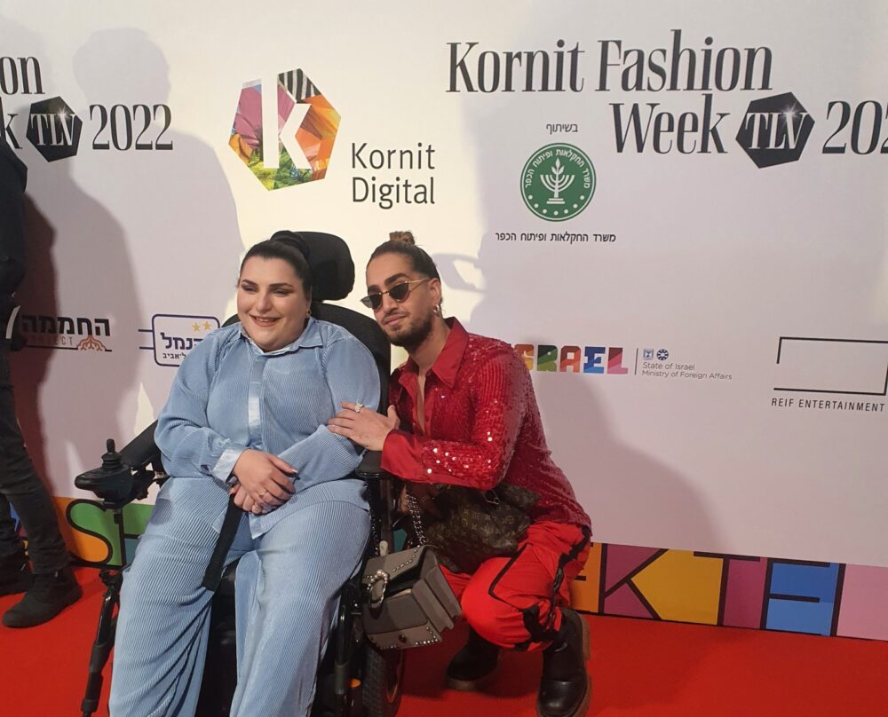 Designer Shon Balaish with a runway model at Kornit Fashion Week Tel Aviv 2022. Photo by Talou L'Oren