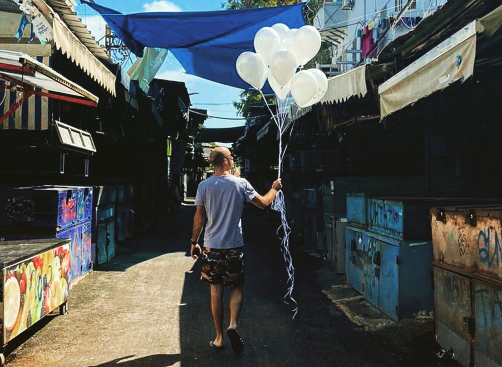 Kenneth Gotlib walking through a Tel Aviv open market after hours. Photo courtesy of Kenneth Gotlib