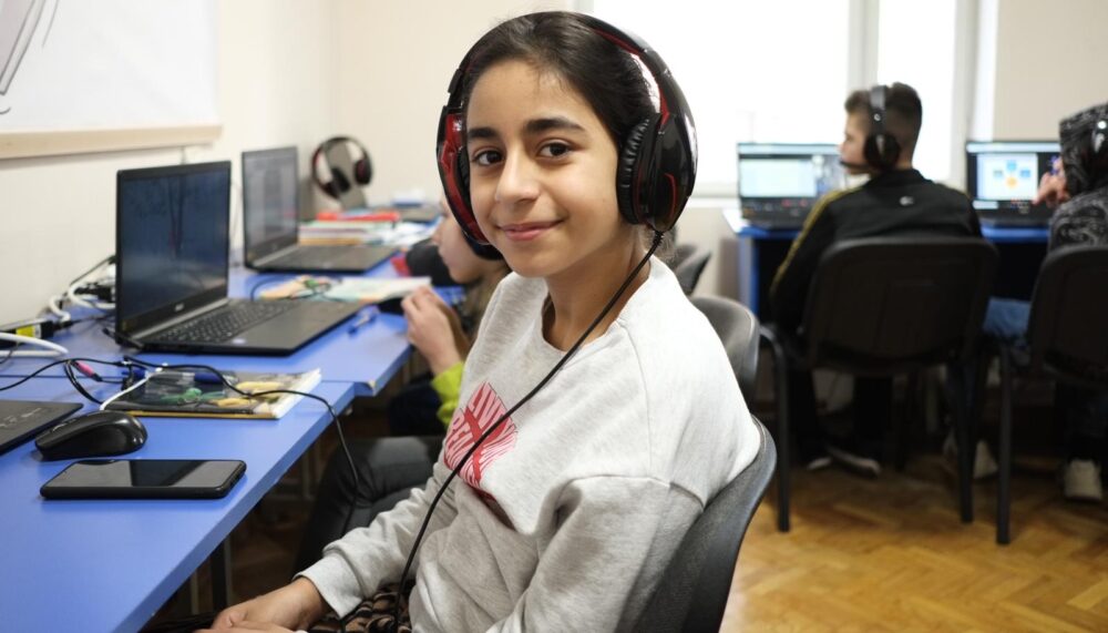 A Ukrainian refugee attending school remotely. Photo courtesy of SmartAID