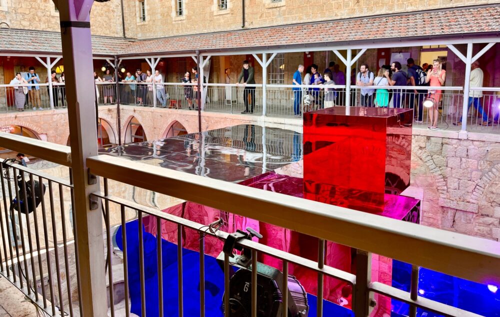 Visitors viewing “Space Reflections” from the upper floors of Hansen House. Photo by Samantha Baron