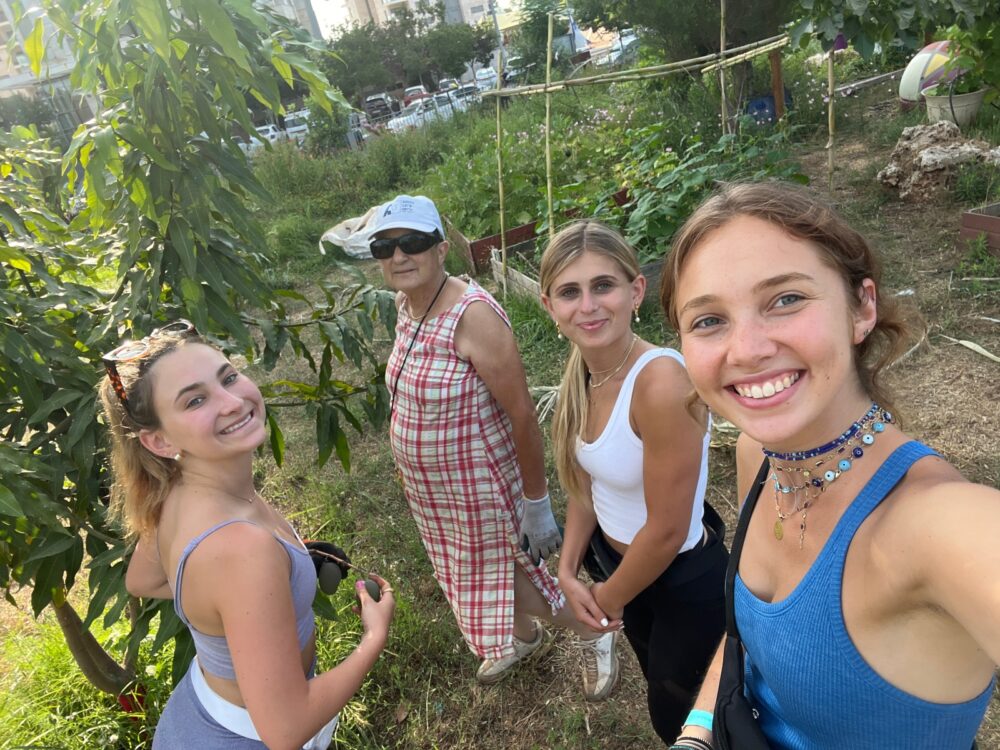 Jordyn Tobasky, far left, Olga, Julia Aroesty and Samantha Baron in the urban garden. Photo by Samantha Baron