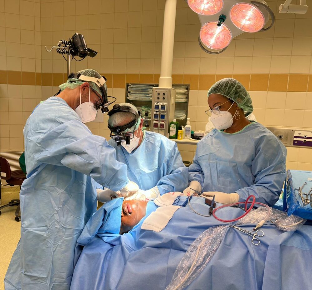 Surgeons Oded Nahlieli and Michael Abba performing a maxillofacial procedure in Equatorial Guinea with a local nurse. Photo courtesy of Dr. Nahlieli