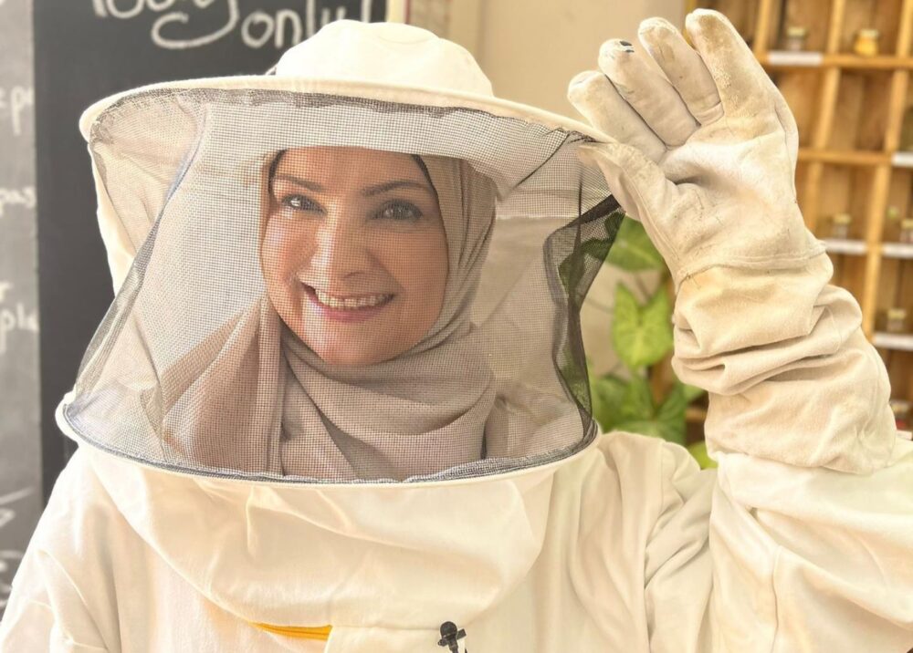 A beekeeper in the Sinsila project. Photo courtesy of Sinsila Center
