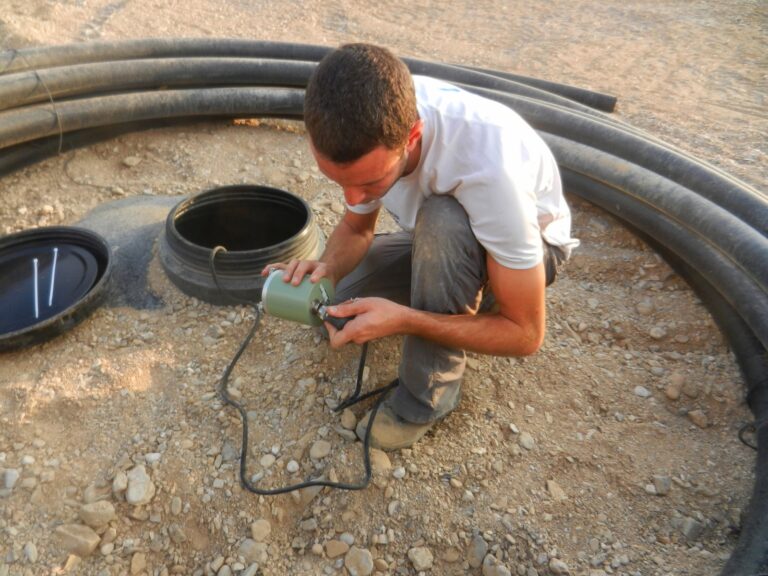 Installing a sensor in Ovnat. Photo courtesy of Andreas Eisermann