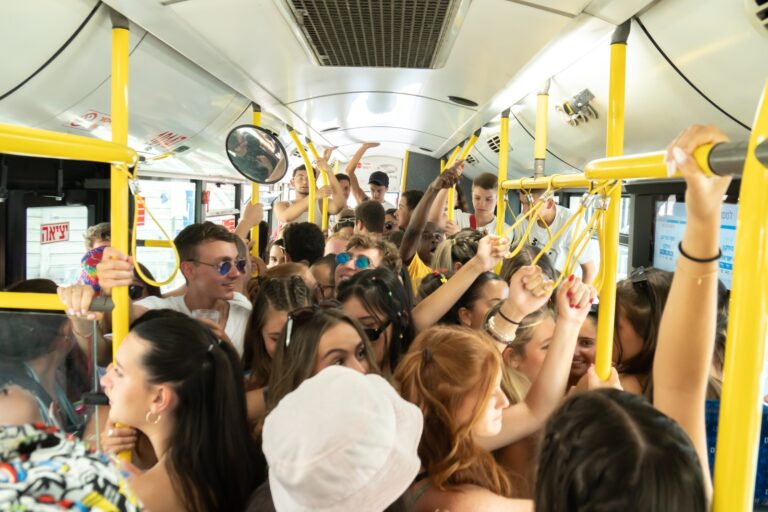Hold on tight on an Israeli bus. Photo by Georgy Dzyura via Shutterstock.com