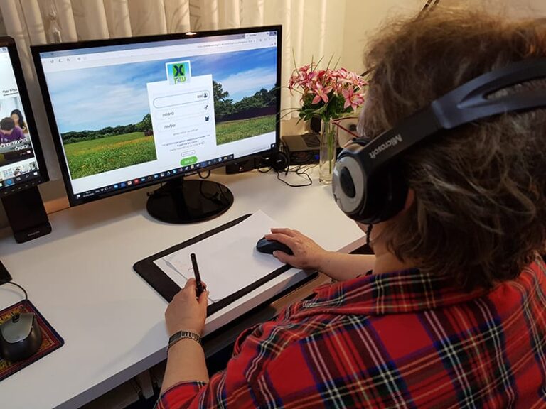 An ERAN volunteer signing off to his work account ahead of the shift. Photo courtesy of ERAN