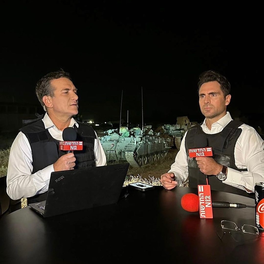 Dany Cushmaro, left, and Tamir Steinman reporting during the war. Screenshot taken from danycushmaro/Instagram