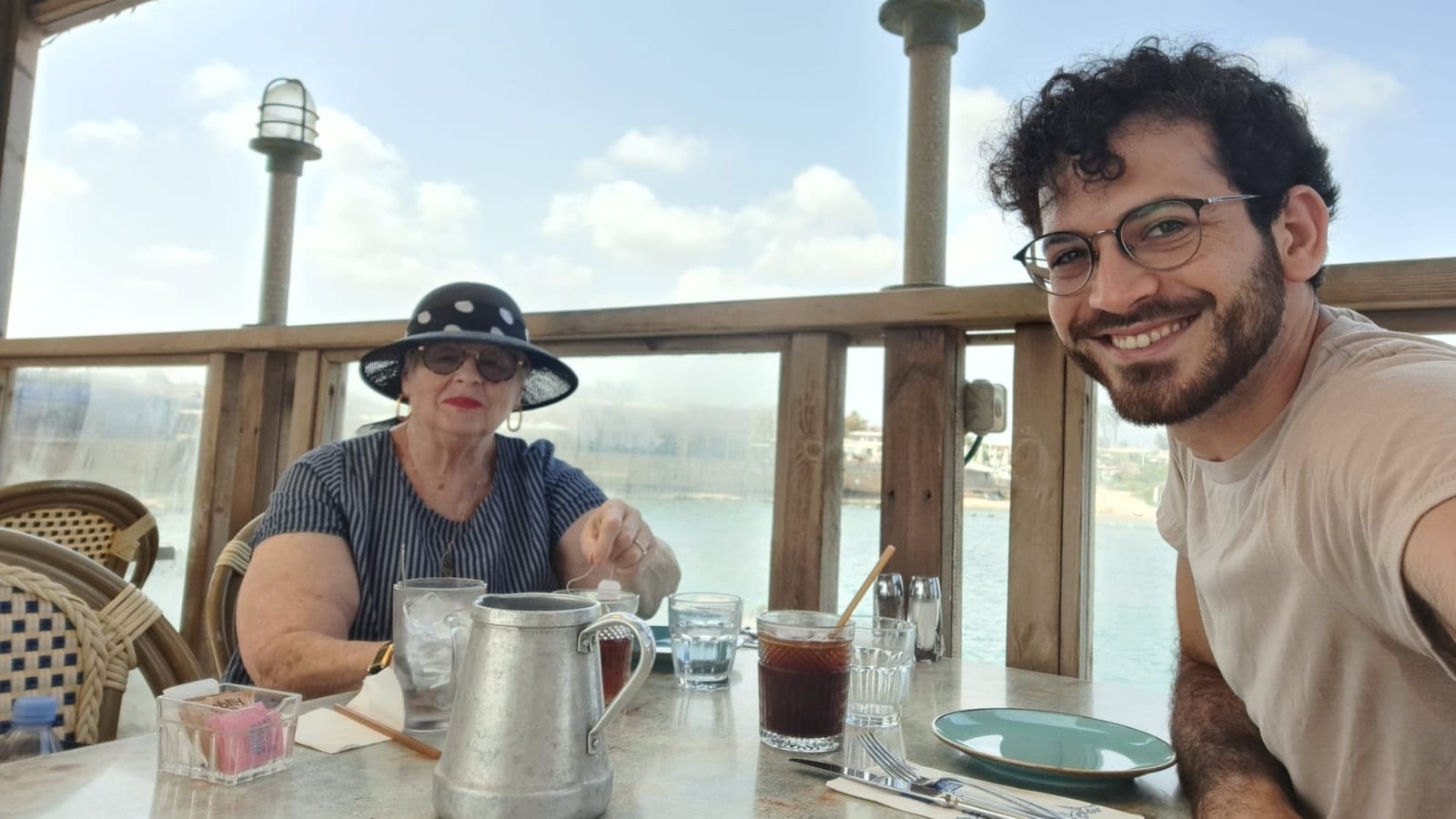Adopt-A-Safta volunteer Ben, right, with Suzanne, the elderly person he’s been visiting for two years. Photo courtesy of Jay Shultz