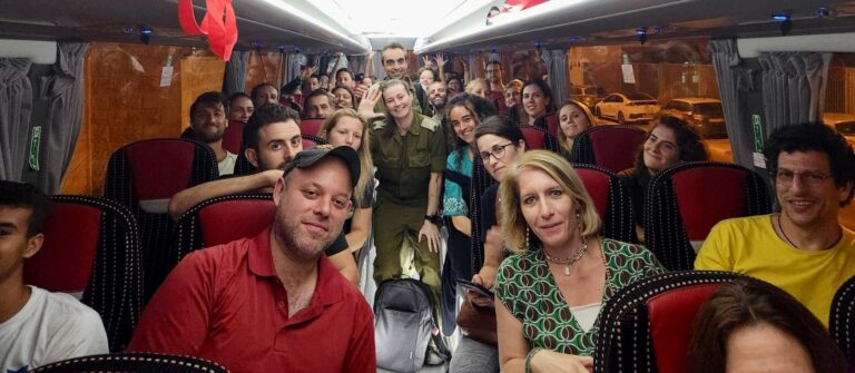 Adopt-A-Safta volunteers and escorts on a bus bringing food and cheer to the south on October 9. Photo courtesy of Jay Shultz