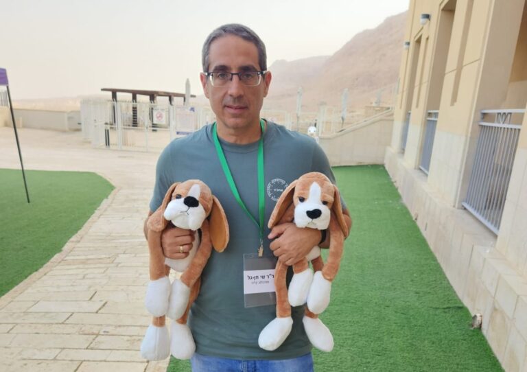 Clinical psychologist Dr. Shai Hen-Gal with Hibuki dolls. Photo courtesy of Dr. Shai Hen-Gal