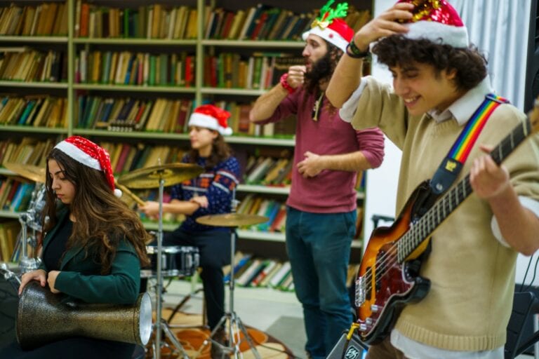 Students play instruments at the school. Photo by Tal Bardak