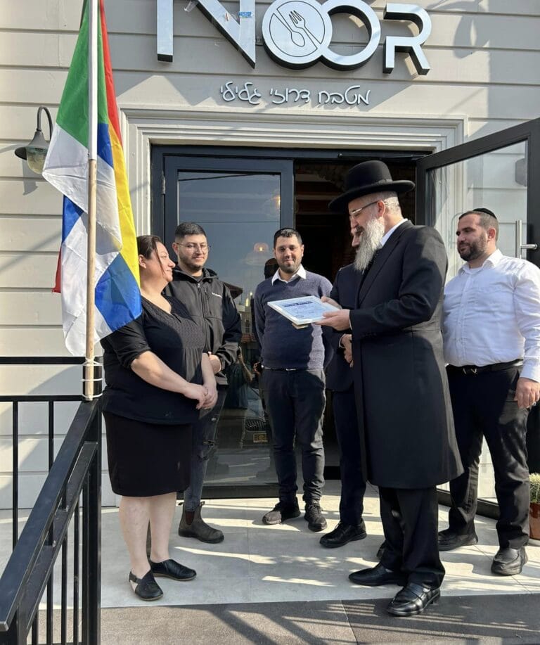 Kosher supervisors presenting Basma Hino with certification on January 2, 2024. Photo courtesy of Noor
