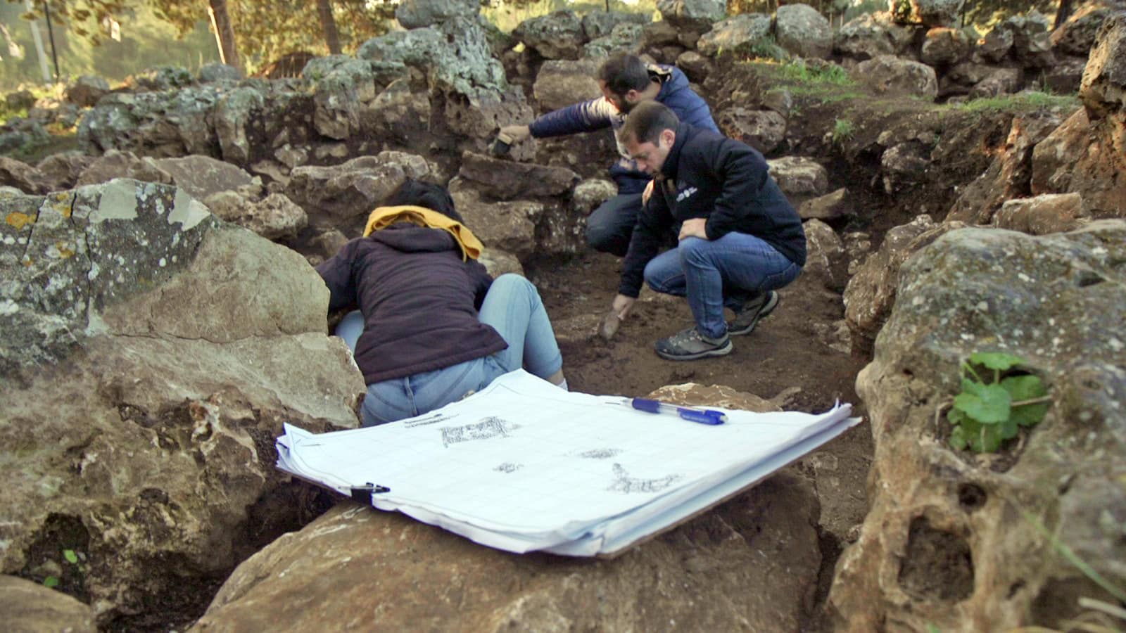 Excavations at the site unearthed an ancient coin, weight and other small artifacts. Photo by Emil Aladjem/Israel Antiquities Authority