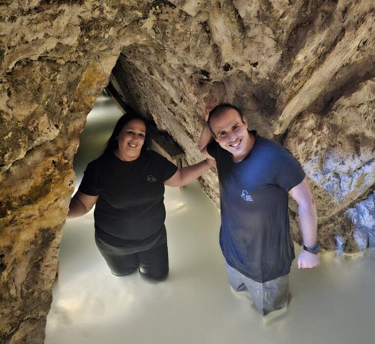Nature and Parks Authority employees at the reservoir filled with water. Photo by Rachel Edri/Nature and Parks Authority