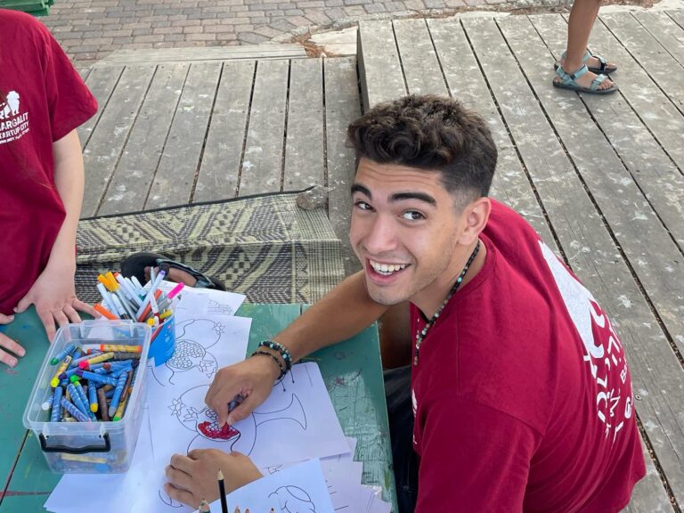 Ophir Barnay works with evacuated children in Tiberias. Photo by Liri Hadar Fishel