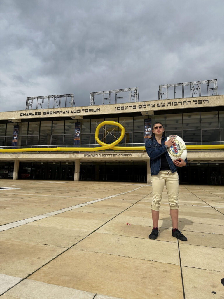 Nili Block with her trophy outside Charles Bronfman Auditorium, Tel Aviv. Photo by Ron Idzon