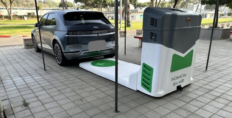 Thomas can slide underneath and charge a car wirelessly. Photo courtesy of BaTTeRi