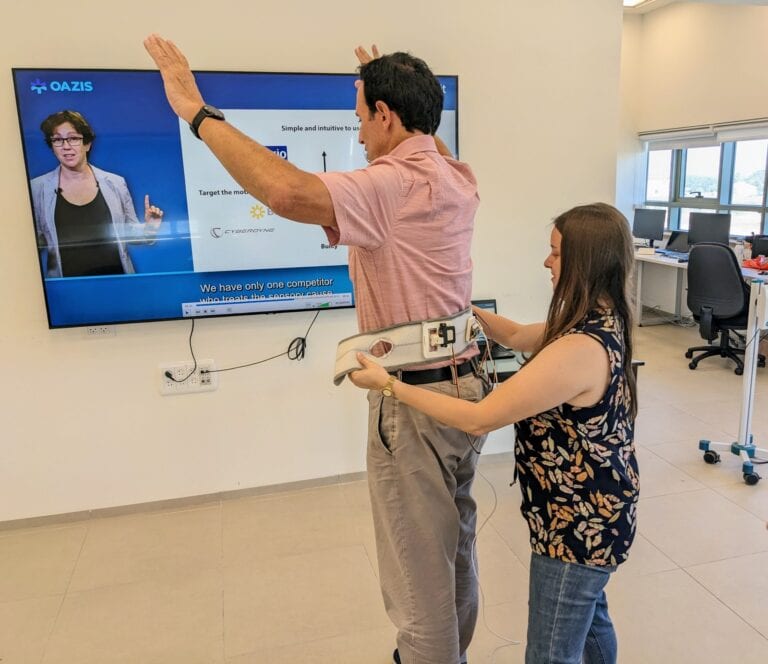 JNF-USA supporter Cliff Russo, a board member of the Sephardic Foundation on Aging, tries out the SenseGait belt. Photo courtesy of ADI Negev-Nahalat Eran