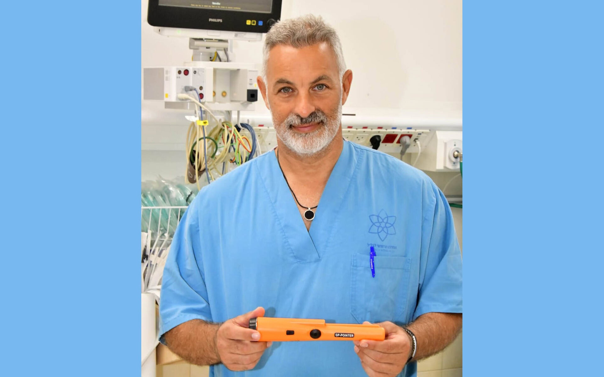 Head and neck surgeon Dr. Eyal Sela with the metal detector. Photo by Roni Albert