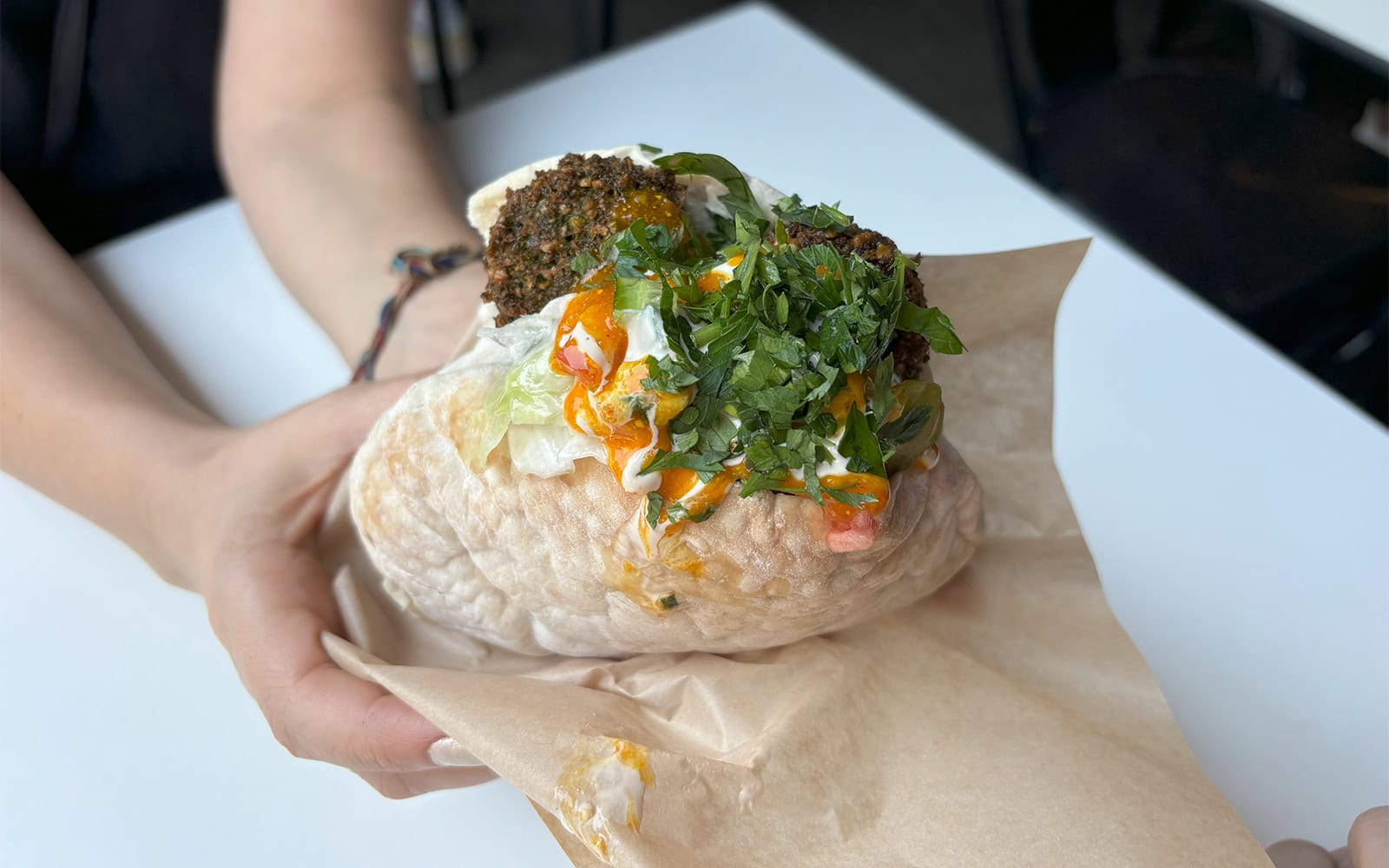 A gluten-free falafel in pita served at HaKosem in Tel Aviv. Photo by Natalie Selvin/ISRAEL21c