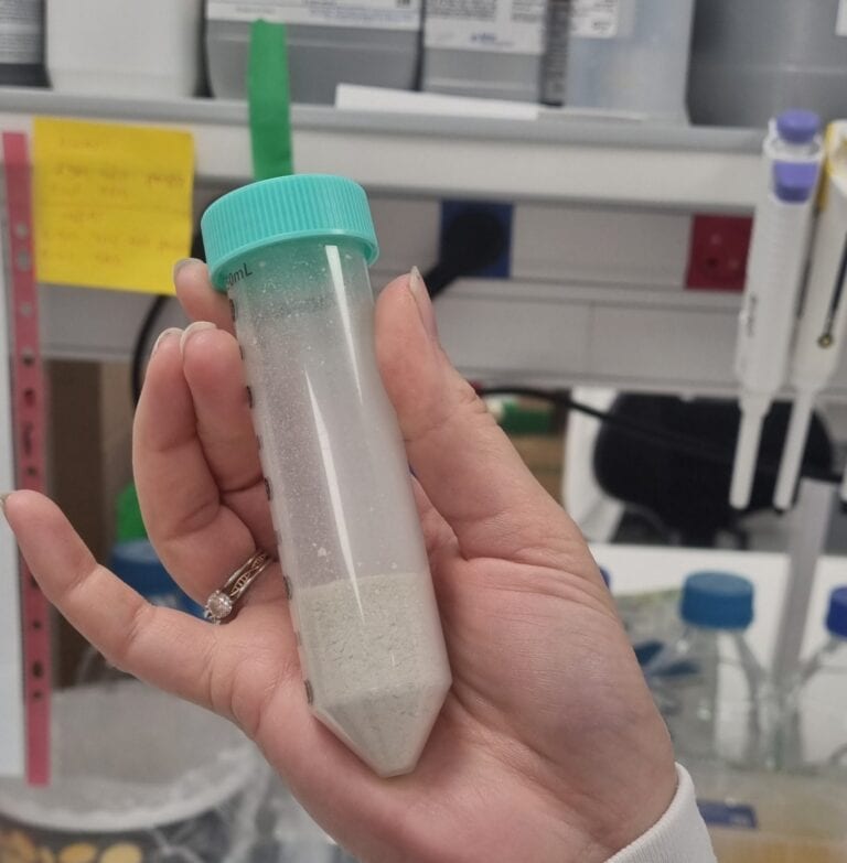 A vial with banana leaf substance that will become protein powder. Photo by Yulia Karra 