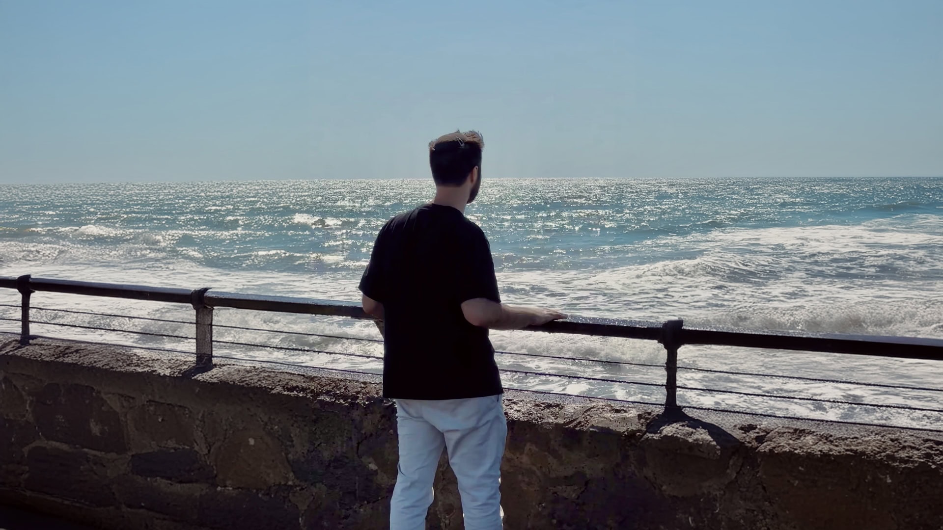 A whole world out there. Eyal Gamba takes a moment to find peace at the beach. Photo courtesy Eyal Gamba