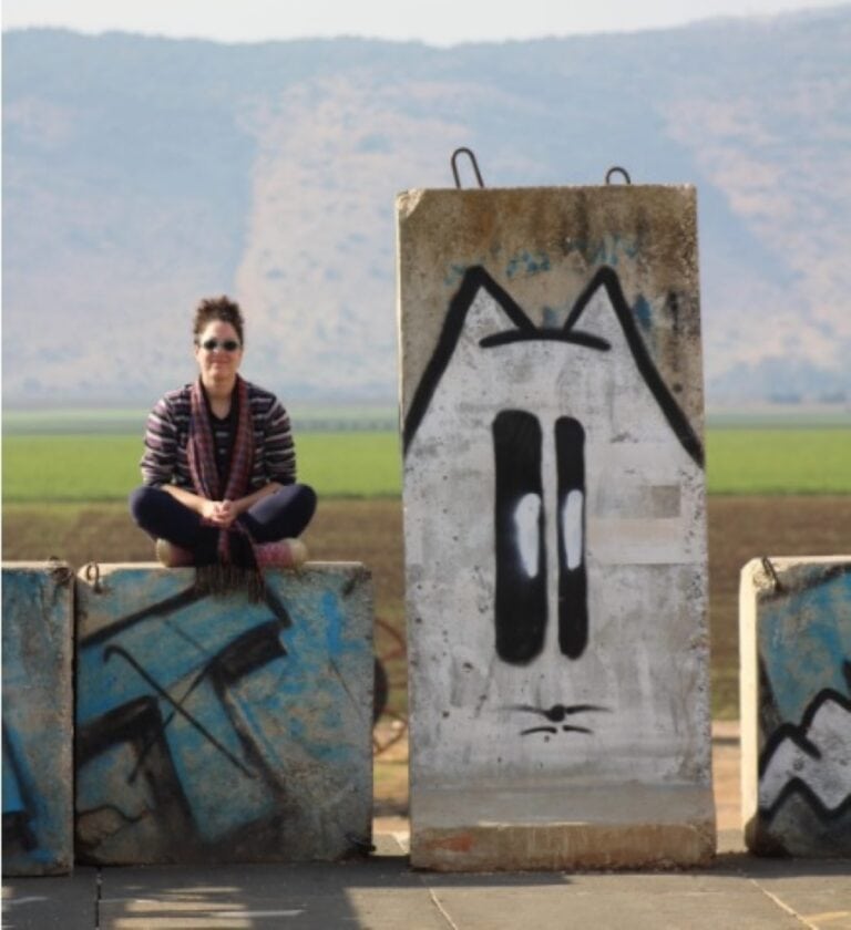 Rita Rubin in front of Naftali mountain range in Upper Galilee, which has been evacuated for over a year. Photo courtesy of Rita Rubin