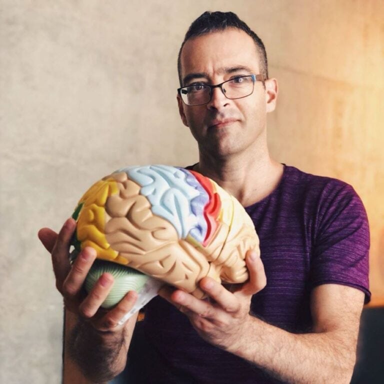 Amit Avron with a model brain. Photo courtesy of Funzing