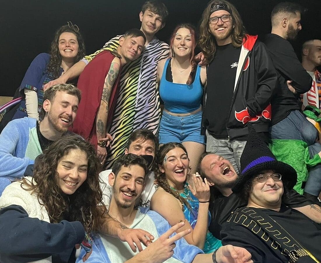 Natalie Selvin, in blue, with guests at a Purim party she and a friend hosted to the soundtrack of EDM music such as dubstep, drum and bass, trance/psytrance and hardstyle. Photo courtesy of Natalie Selvin
